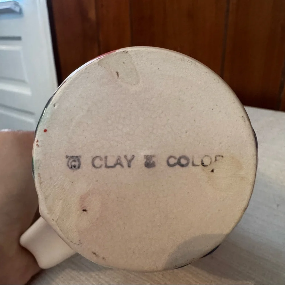 Vintage Clay & Color studio pottery mug featuring a hand-painted abstract design